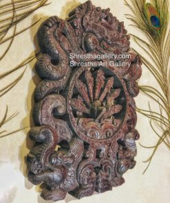 carved wooden peacock and bhairav